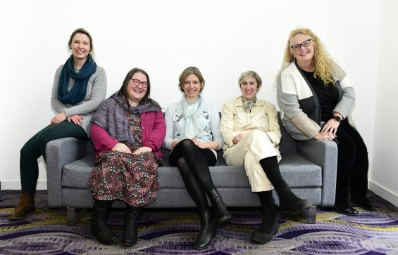 photo of surface echoes team, 5 people sitting informally on a sofa